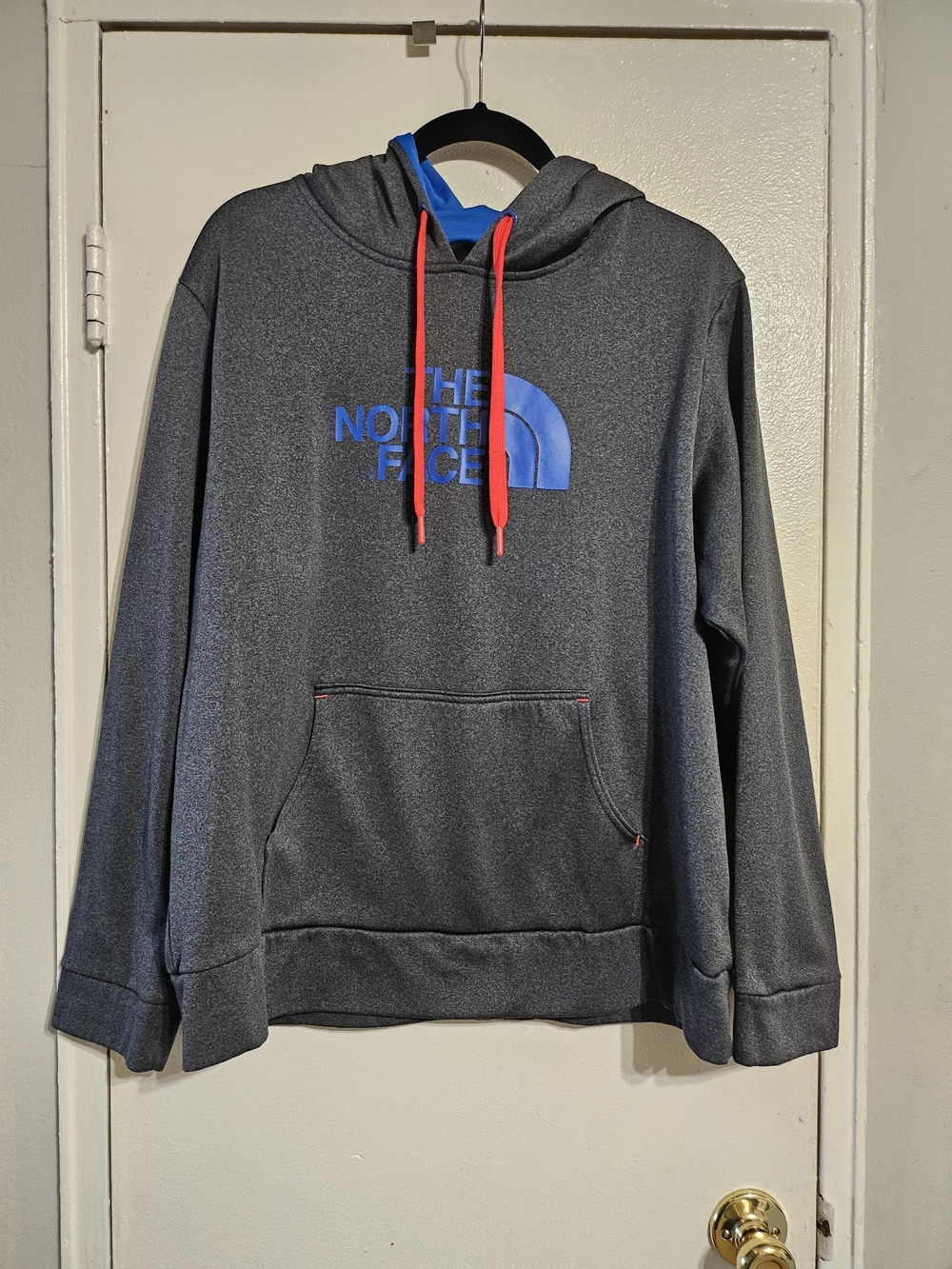 The North Face Gray Hoodie with Blue Logo and Red Drawstrings